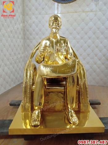 Tượng Bác Hồ ngồi đọc báo nhân dân xã luận cao 60cm mạ vàng 24k..!