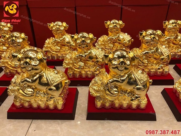 Ý nghĩa của linh vật heo ôm bắp cải tới tài lộc của gia chủ năm 2019