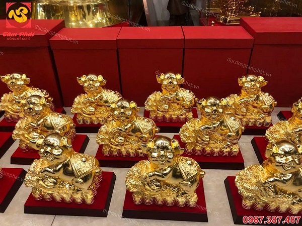 Ý nghĩa của linh vật heo ôm bắp cải tới tài lộc của gia chủ năm 2019
