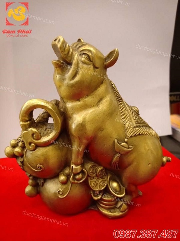 Ý nghĩa của tượng lợn phong thủy bằng đồng